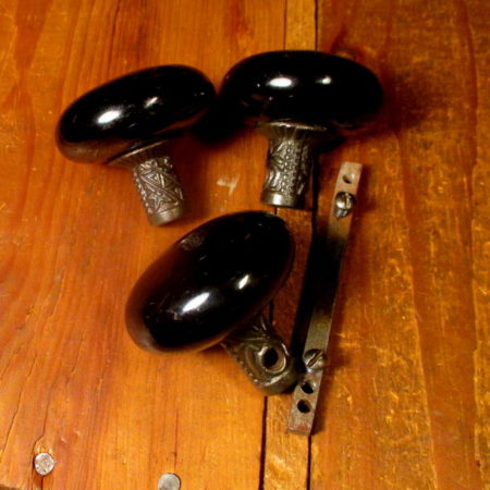 Black Pottery Knob Ornate Iron Shank